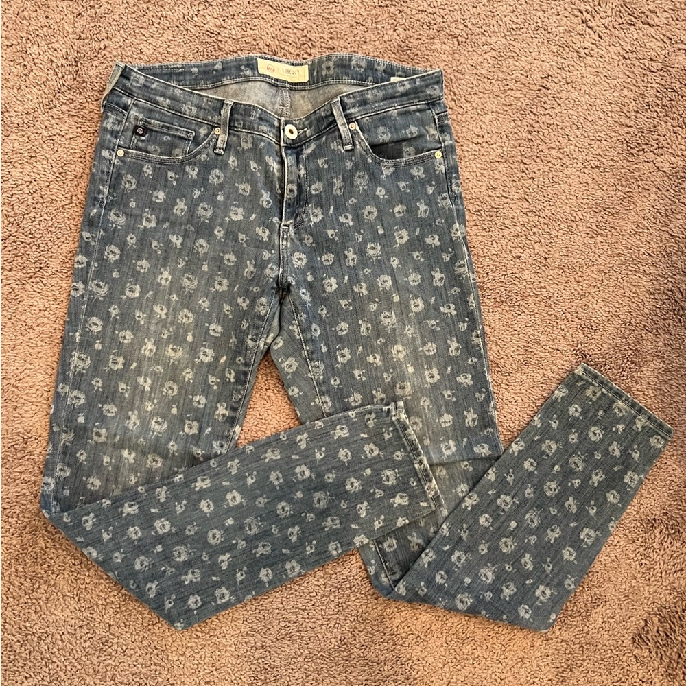 AG mid rise skinny ankle Jean with floral design